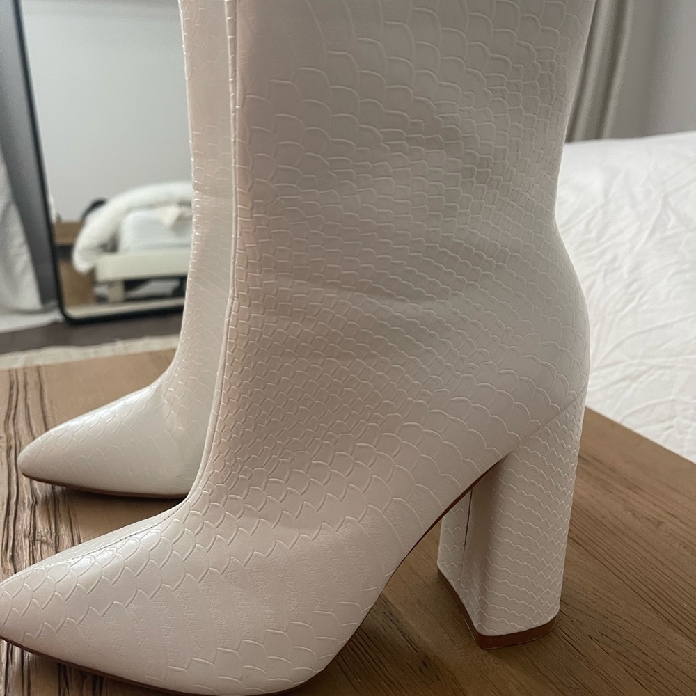 White snakeskin booties